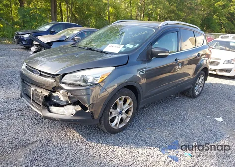 2016 Ford Escape Titanium z USA, uszkodzony, nr VIN 1FMCU9J94GUB85476